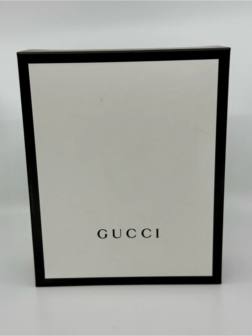 Gucci Black Embossed GG Leather Phone Bag
